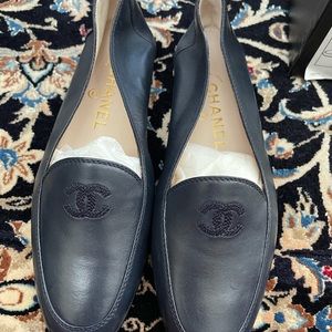 Authentic never worn dark navy Chanel loafers